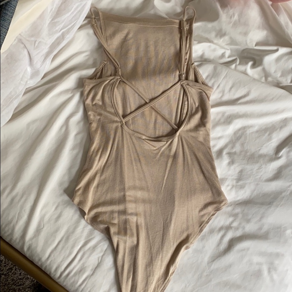 NUDE BODY SUIT NEVER WORN